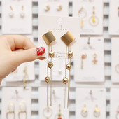 Új, arany színű női fülbevaló modell