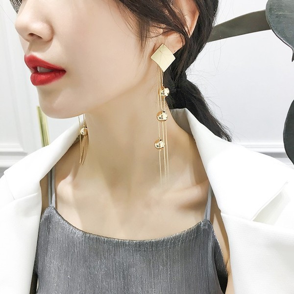 Új, arany színű női fülbevaló modell