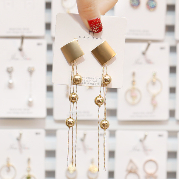 Új, arany színű női fülbevaló modell