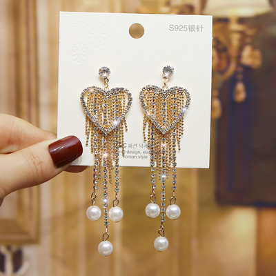 Modern női fülbevaló arany színben kövekkel és gyöngyökkel