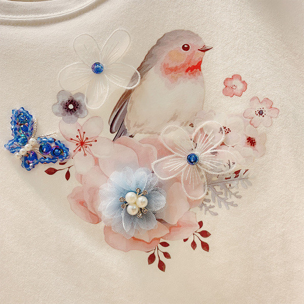 Stílusos női póló 3D elemmel több színben