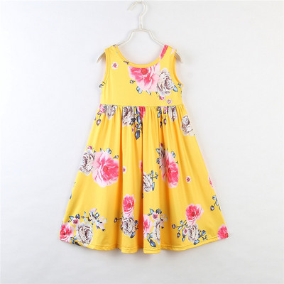 Stílusos hosszú gyerekruha sárga színben virágos motívumokkal