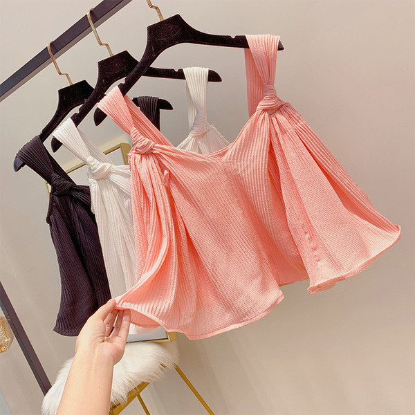 Stílusos női felső, vastag pántokkal és V-nyakú, többféle színben