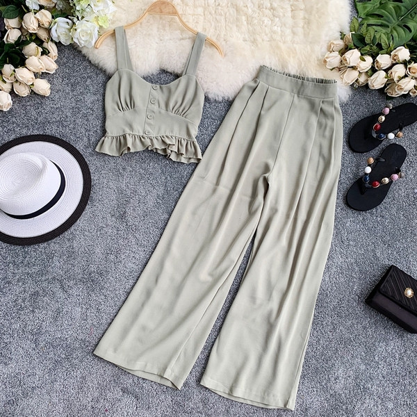 Set elegant de damă care include un maiou scurt și pantaloni largi cu talie înaltă în mai multe culori