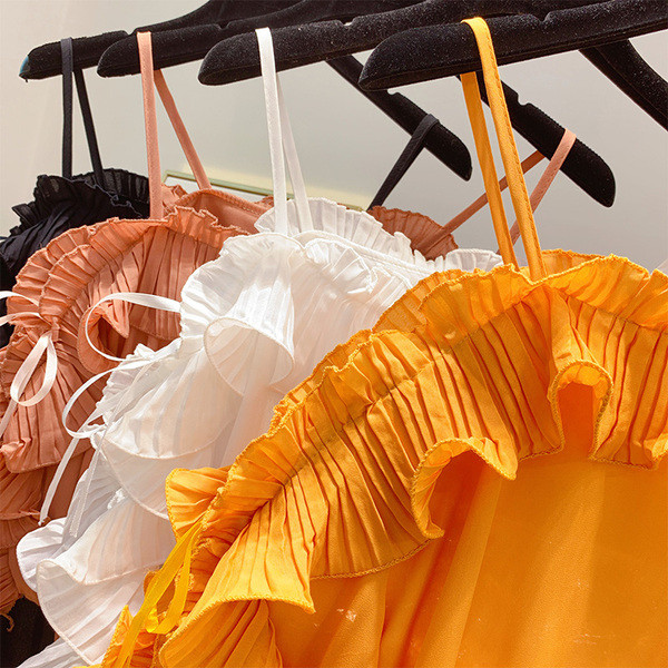 Stílusos női blúz több színben, vékony pántokkal