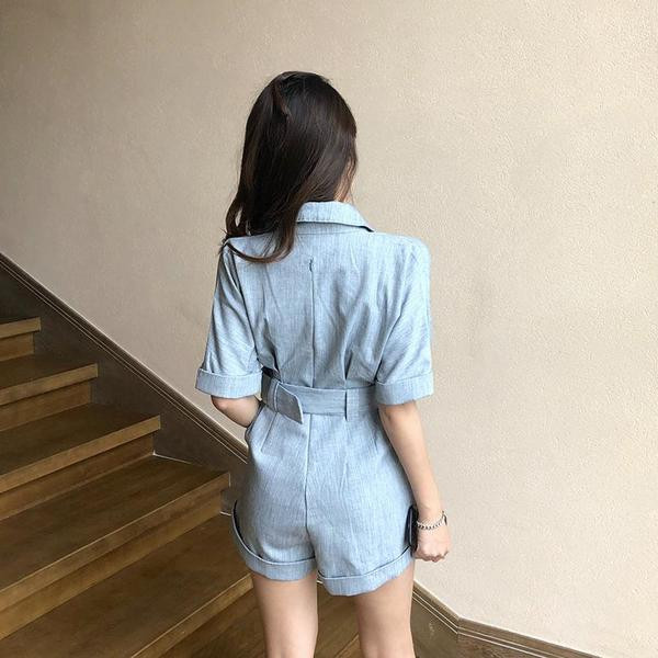 Stílusos női overall kék színű övvel