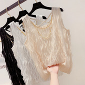 Stílusos női felső, fém díszítéssel, három színben