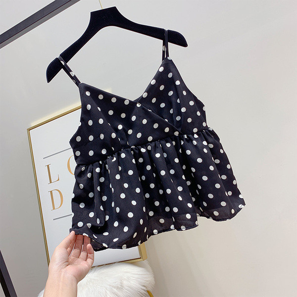 Női felső, fehér és fekete pöttyökkel