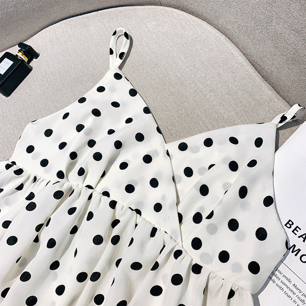 Női felső, fehér és fekete pöttyökkel