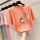 Modern női póló virágdíszítéssel