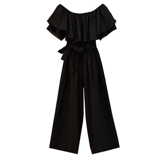 Stílusos női overál csupasz vállfeketével