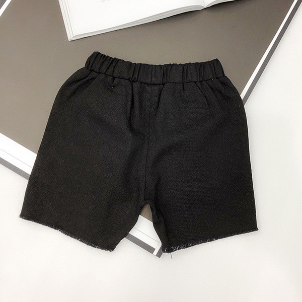 Gyermek rövidnadrág fiúknak két színben, rátéttel
