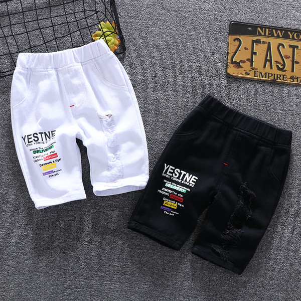 Pantaloni scurți pentru copii în două culori cu inscripții - pentru băieți