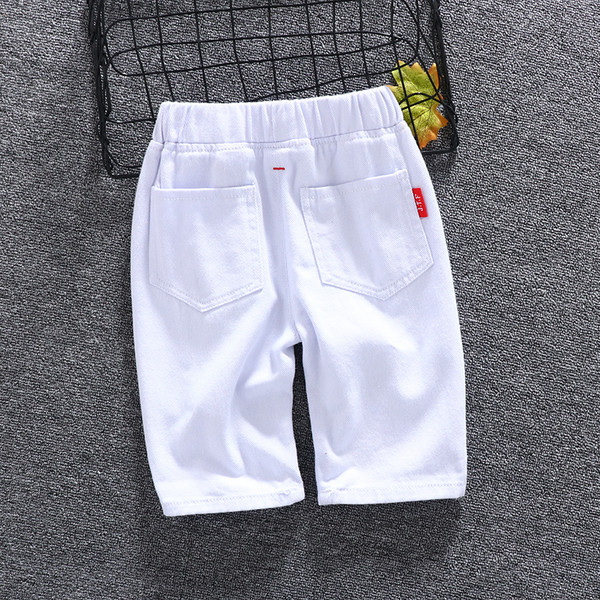 Pantaloni scurți pentru copii în două culori cu inscripții - pentru băieți