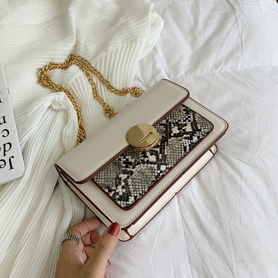 Aktuális női kis táska fém füllel több színben