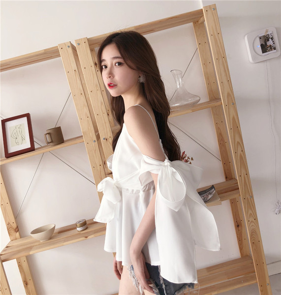 Stílusos női felső csupasz vállakkal, fehér és fekete színben