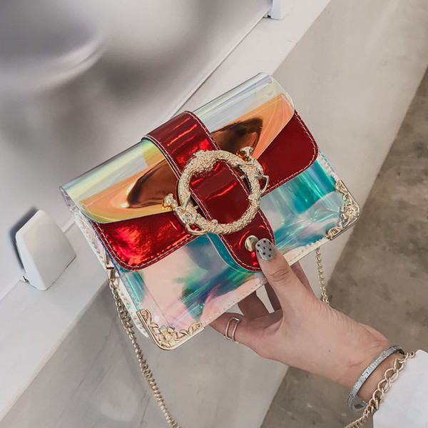 Kis női táska hosszú füllel, több színben