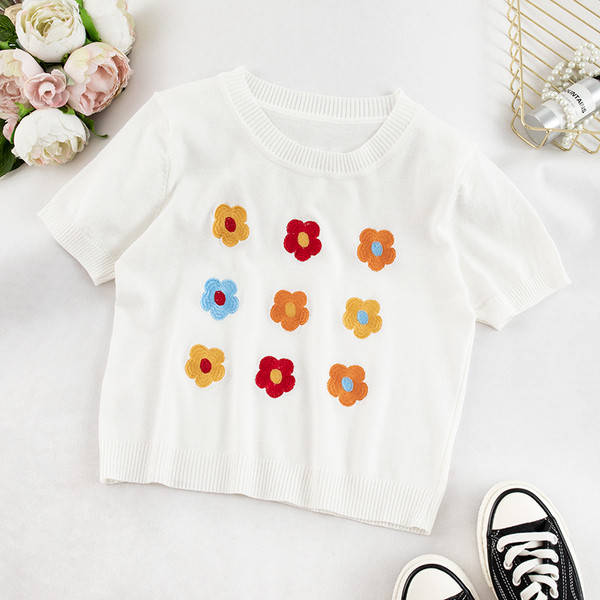 Alkalmi női póló virágokkal több színben