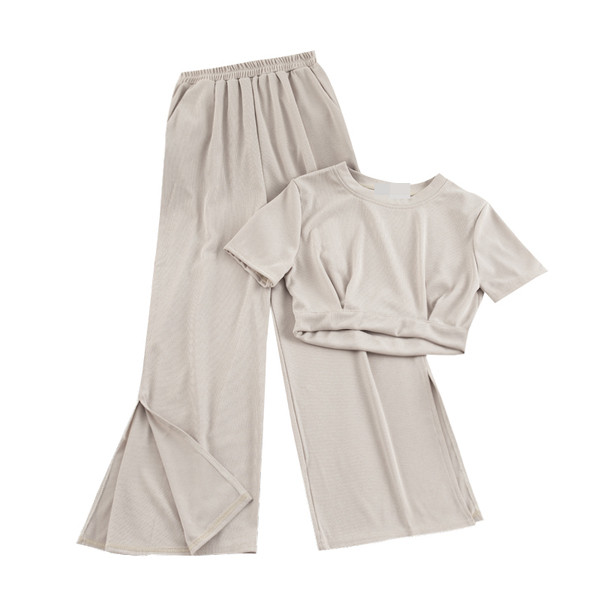 Két darab nadrágból és blúzból álló alkalmi női szett több színben