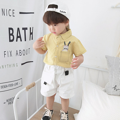 Modern gyereking fiúknak fehér és sárga színben, rátéttel