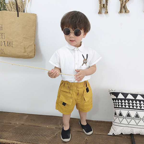 Modern gyereking fiúknak fehér és sárga színben, rátéttel