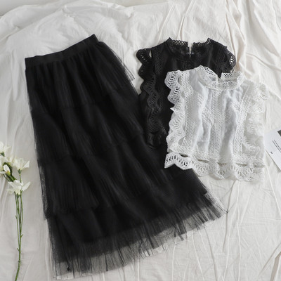 Стилен дамски комплект от пола + топ в черен или бял цвят