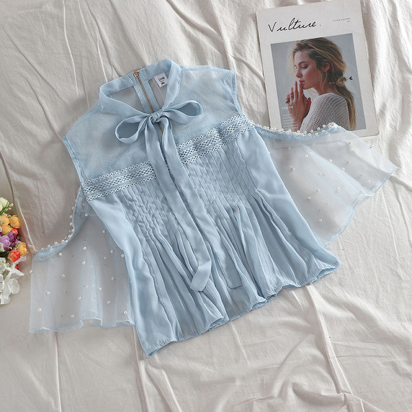 Új modell női topp gyöngy elemmel négy színben