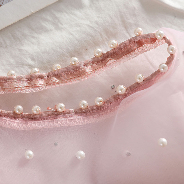 Új modell női topp gyöngy elemmel négy színben