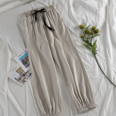 Pantaloni moderni de dama cu panglica