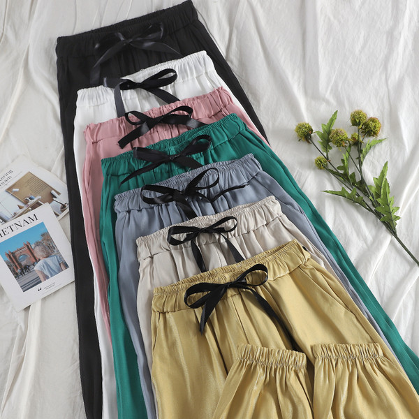 Pantaloni moderni de dama cu panglica