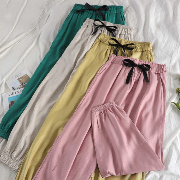 Pantaloni moderni de dama cu panglica