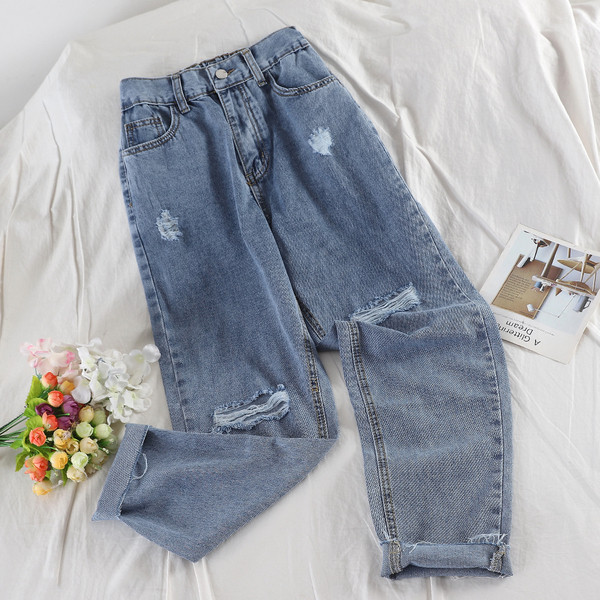 Női hosszú farmer szakadt elemekkel