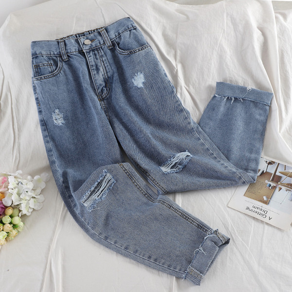 Női hosszú farmer szakadt elemekkel