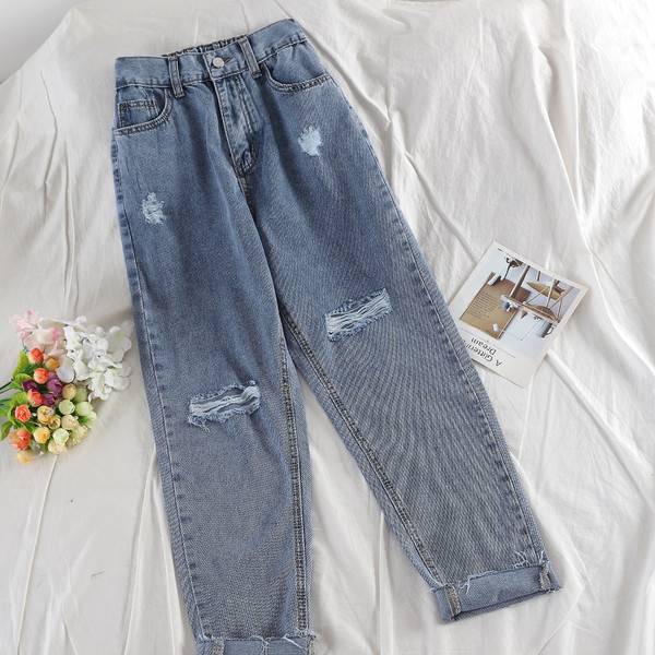 Női hosszú farmer szakadt elemekkel