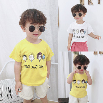 Детска тениска в бял и жълт цвят с апликация-за момчета