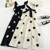 Stílusos női pöttyös ruha fehér és fekete színben