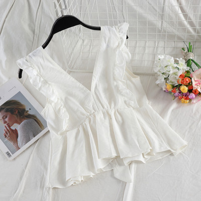 Stílusos női felső V-nyakkal és szalaggal