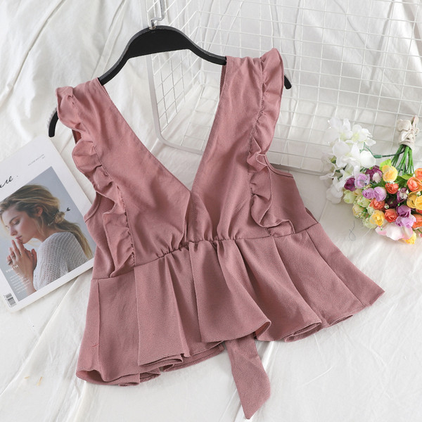 Stílusos női felső V-nyakkal és szalaggal