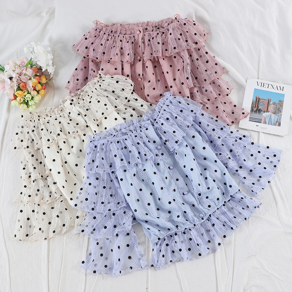 Modern női pöttyös blúzok többféle színben