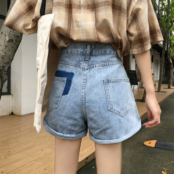 Alkalmi női farmer magas derékkal, világos színben