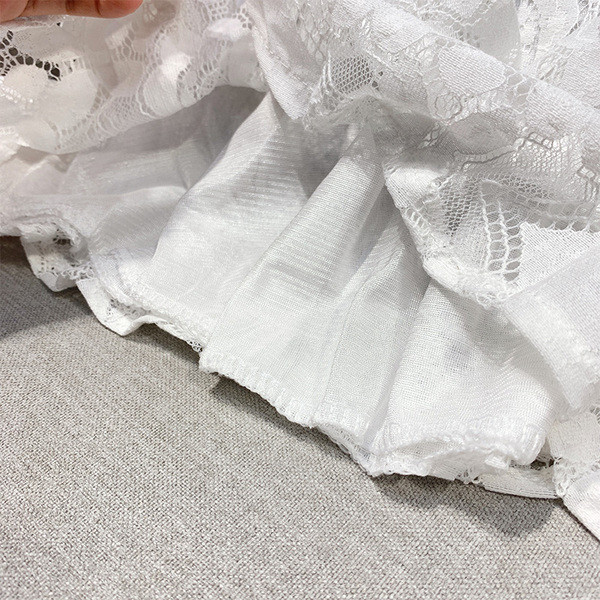 Női csipkeblúz fekete-fehér színben