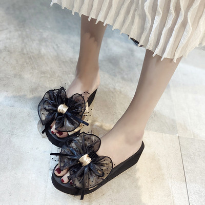 Modern női papucs szalaggal, két színben