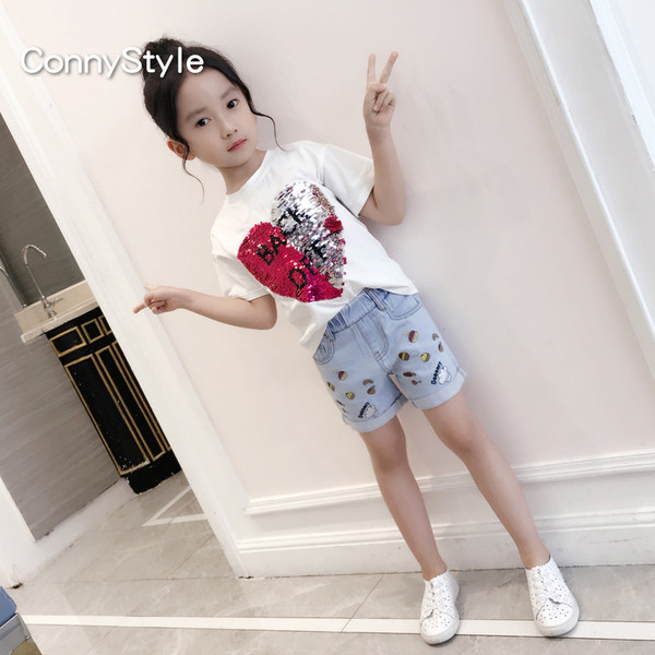 Σύγχρονη μπλούζα για κορίτσια με πούλιες