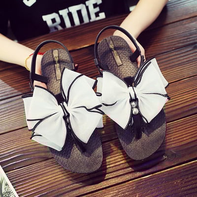 Modern női szandál szalaggal és gyöngyökkel több színben