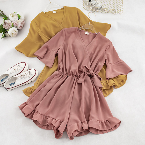 Modern női jumpsuit rövid ujjú több színben