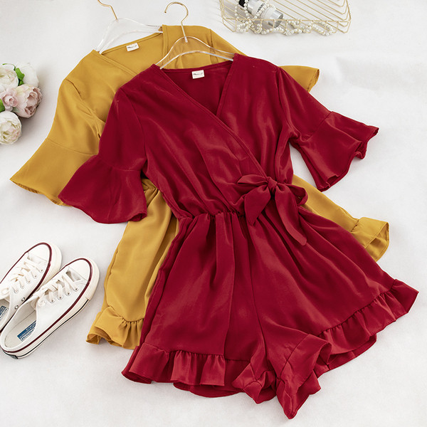 Modern női jumpsuit rövid ujjú több színben