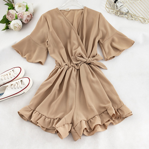 Modern női jumpsuit rövid ujjú több színben