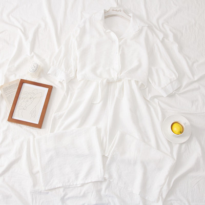 Modern női overall 3/4-es ujjakkal és gombokkal