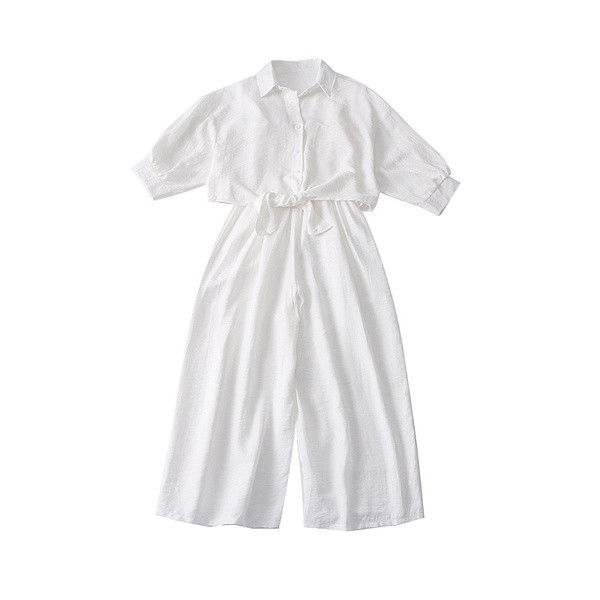 Modern női overall 3/4-es ujjakkal és gombokkal