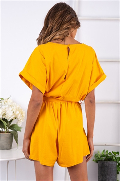 Női alkalmi overall, sárga színű övvel